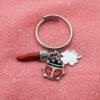 Anello Regolabile in Acciaio con Ciondoli Portafortuna, Cornetto Rosso, Coccinella e Quadrifoglio